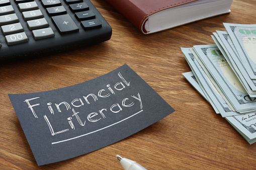 Financial Literacy is shown on the conceptual business photo