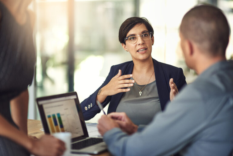 Woman using hands to explain a concept