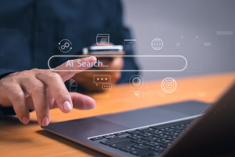 Concept Using AI search for information or search engine optimization ,SEO, Man hand tapping on virtual search bar while using laptop, show search for information with internet technology connection.