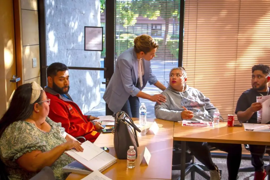 Discussion with clients in meeting room